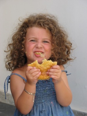 Arianna eating a cheese pie