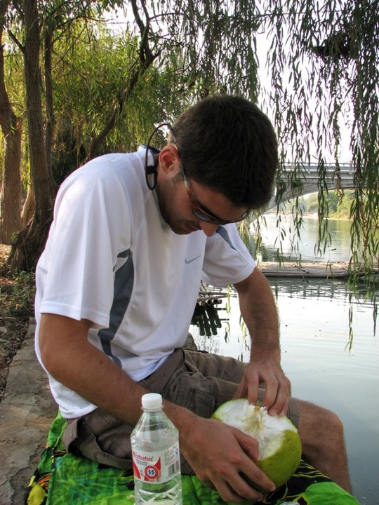 Joe trying to peel pomelo