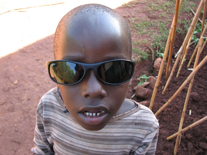 With sunglasses